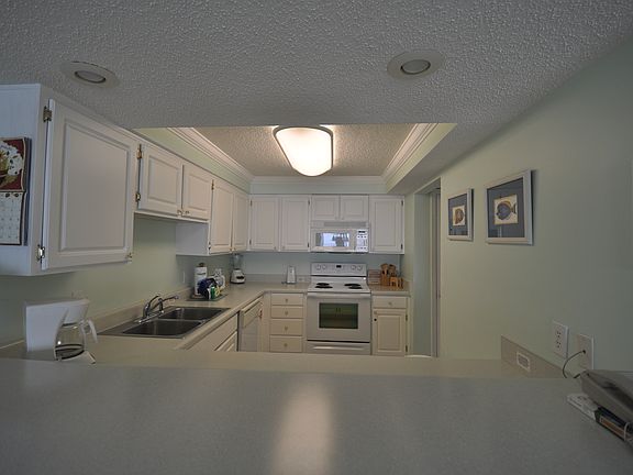 4th image of 675 Scenic Gulf Dr Unit 401B