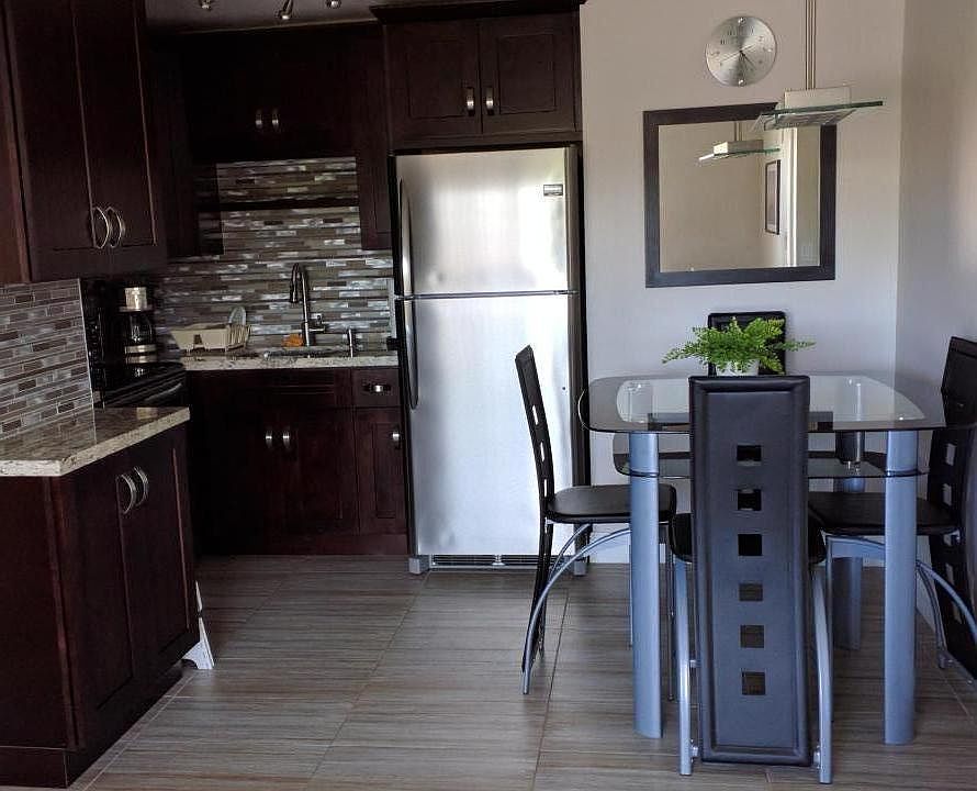 Kitchen and Dinning area, with fan.