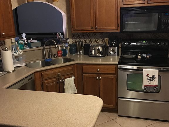Kitchen overlooks living room