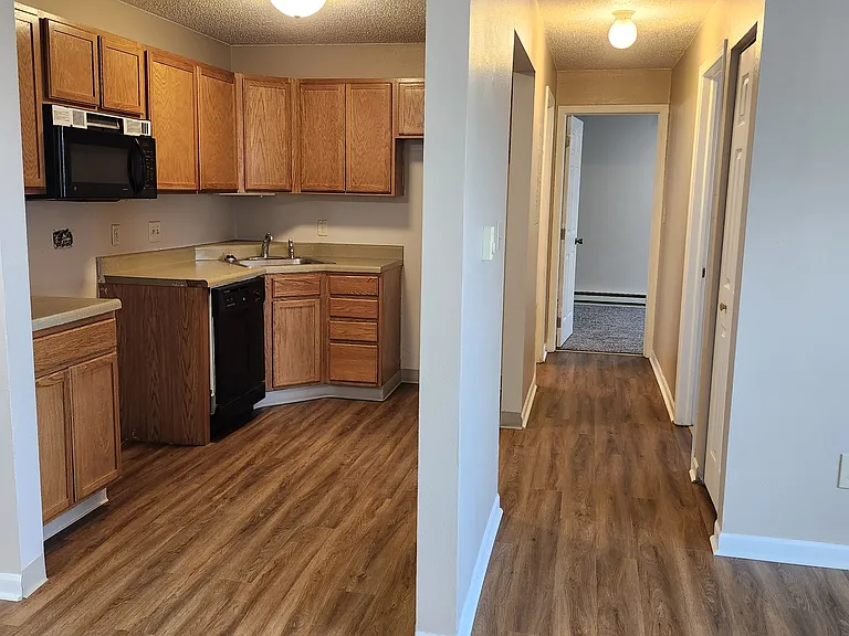 New oven/range & refrigerator will be installed by owner. Not present at time of photos.