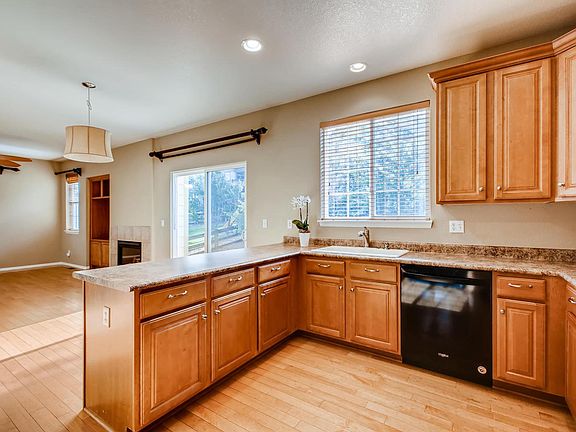 Kitchen is open to the breakfast nook and family room