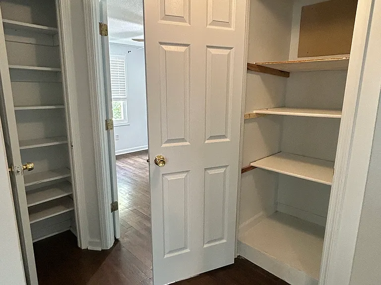 Hallway closets for storage.