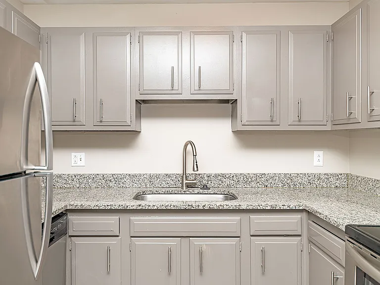 Kitchen with granite counters and stainless appliances