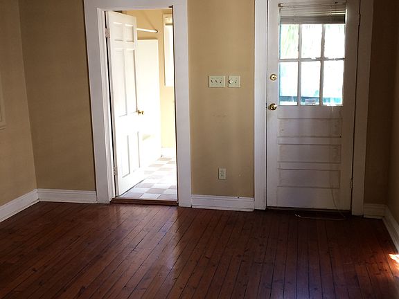 Door to back yard and door to bath