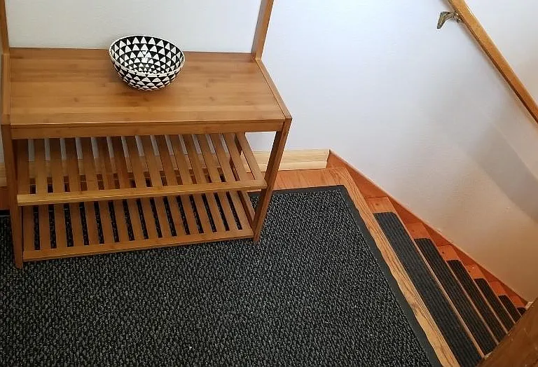 Entry - stairs from the front entry, to both floors.