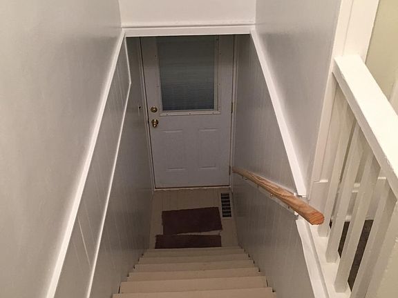 This front entry leads up to the second floor apartment.