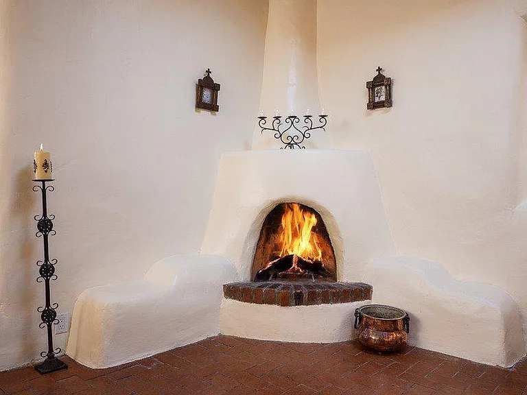 Kiva wood burning fireplace.