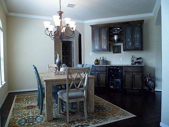 Very welcoming dining room with built in beverage cooler and serving bar