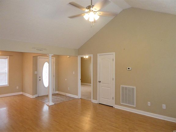 Ceiling fans throughout. Blinds on all windows.