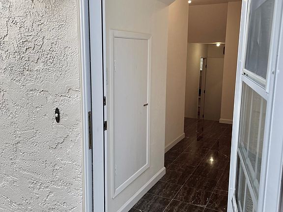 Entry to unit, access through the side yard.