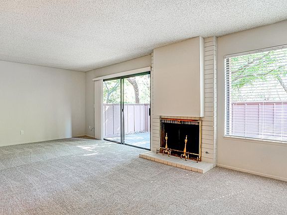 Spacious living room with slider to patio.
