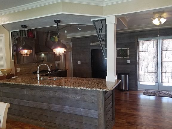 shiplap wall/granite counter