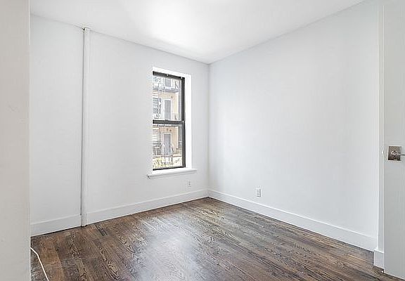 5th image of 117 E 7th St APT 3E