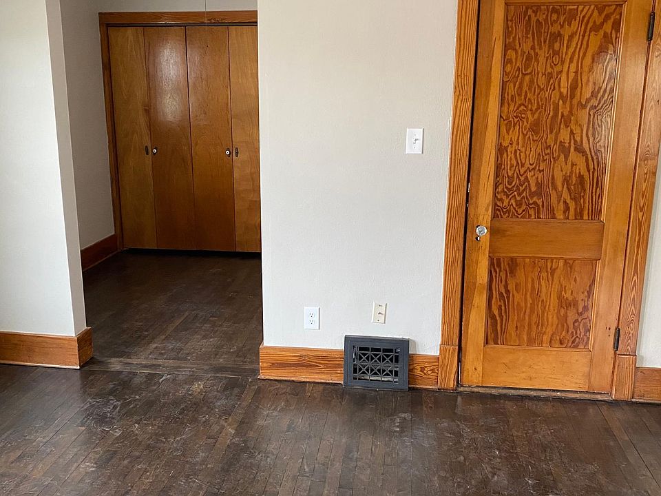 Standing in the living room looking at the nook/office area to your left and the door on the right is the private entrance down to the font of the house/front porch