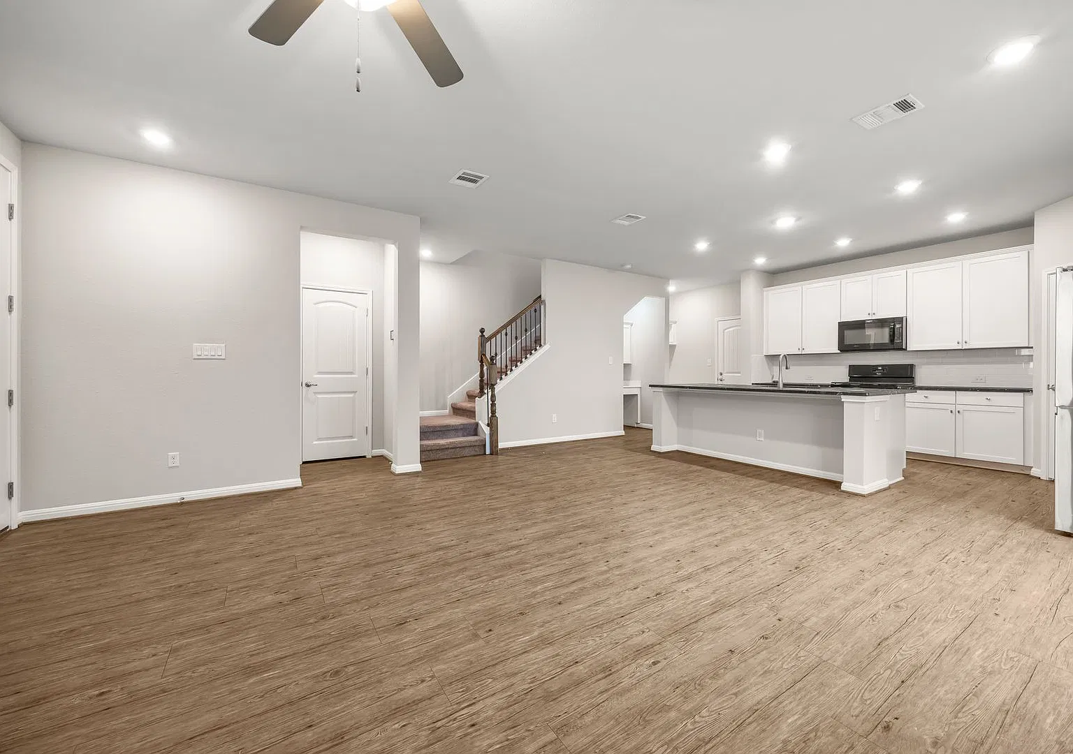 Spacious 3-Bedroom Home with Upstairs Game Room, Hardwood Floors & Upgraded Garage! — Photo 4