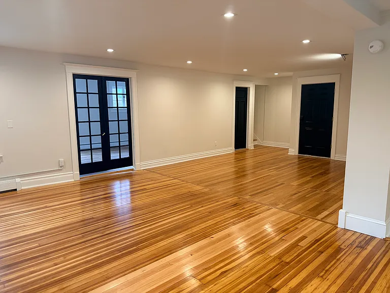View from dining area. French doors to 2nd floor bedroom.