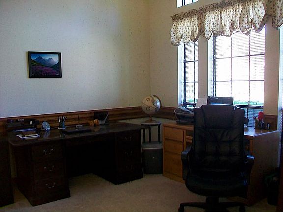 STUDY WITH WOOD BEAM CATHEDRAL CEILING