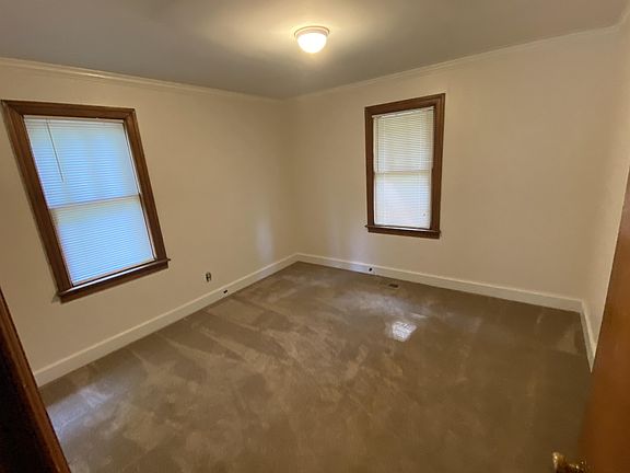 The two downstairs bathrooms are carpeted.