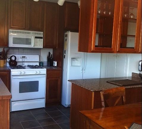 Kitchen with granite slab
