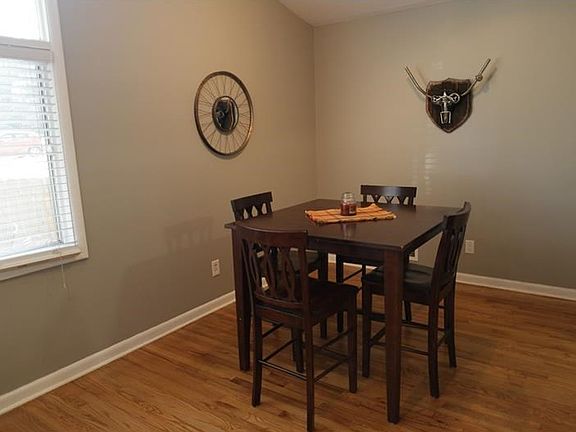 Dining area is open to both the kitchen and the living room