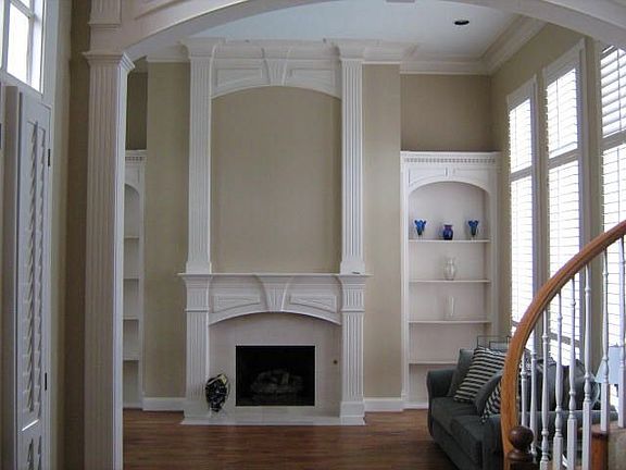 20 ft ceiling living area with fireplace