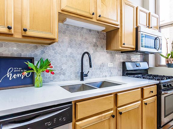 Recent kitchen upgrades include quartz countertops