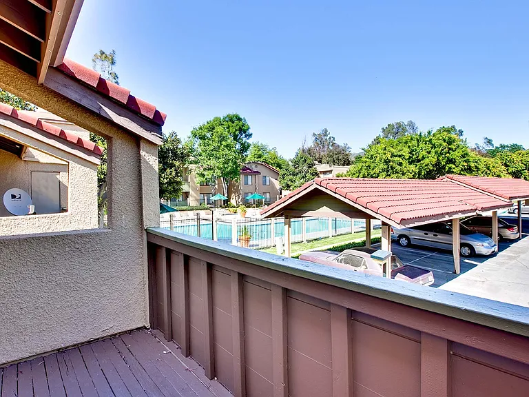 Some private patios offer a view of the swimming pool