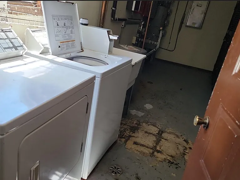Laundry .... in common area behind kitchen
