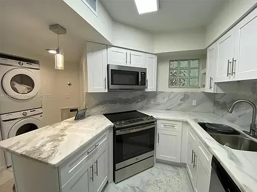 9156 Collins Ave Photo 1