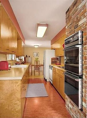 Galley style kitchen with double oven