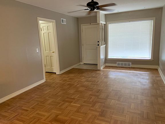 Refinished hardwood floors in living, dining and hallway