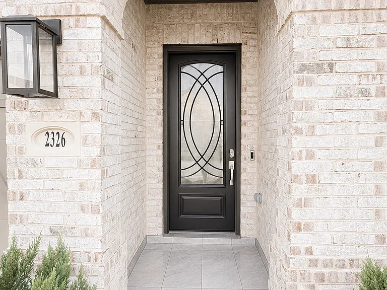 Front door Porch with Tile Flooring