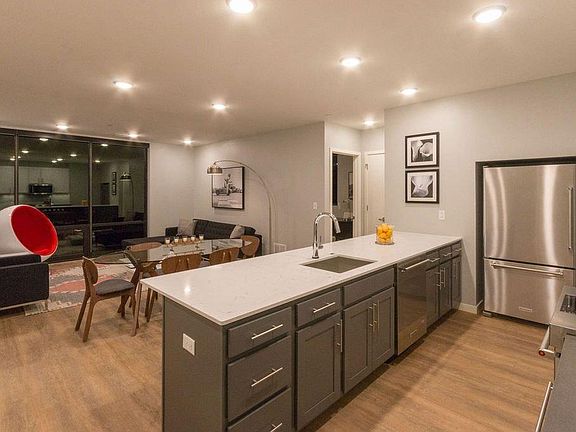 Ours has white cabinets and darker wood floors