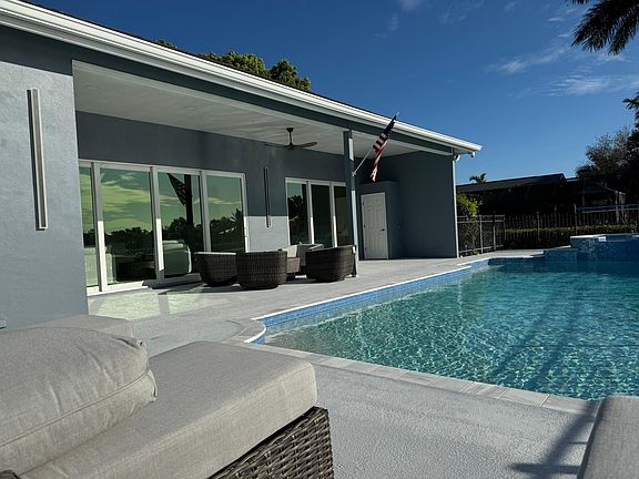 Outdoor seating area around gas firepit