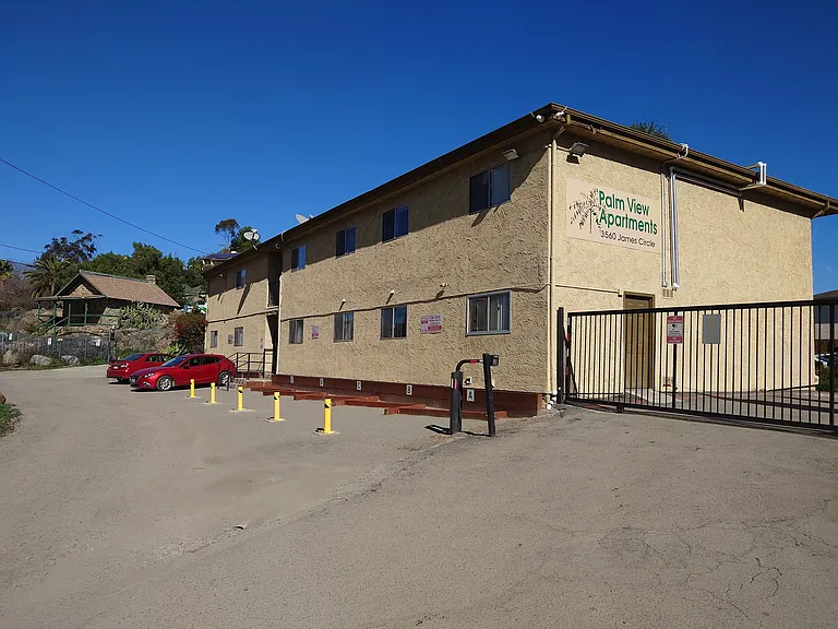 Front of the building with additional parking