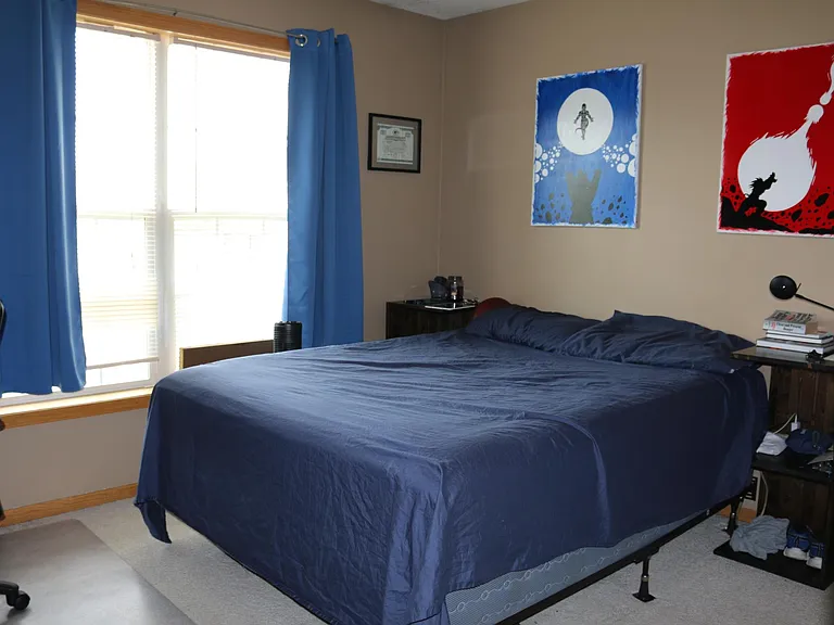Second bedroom with double windows and full closet