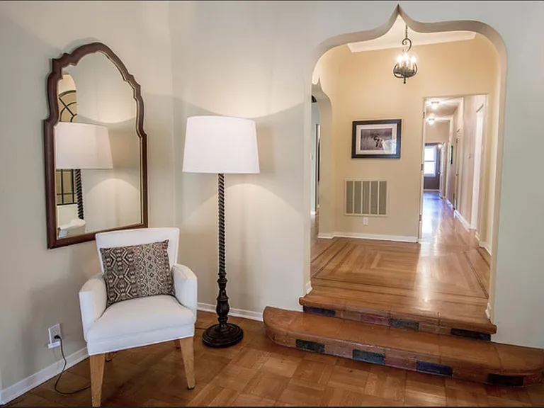 center foyer between dining and hall leading to bedrooms - original doors