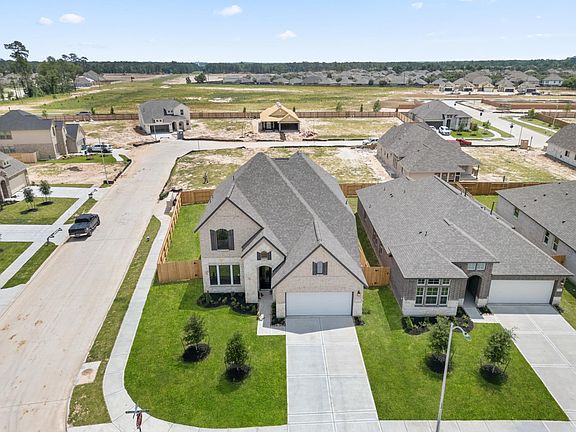 An additional view of your home, neighborhood and oversized corner lot.