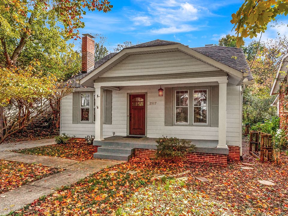 Great curb appeal in side-walk lined street with mature trees.