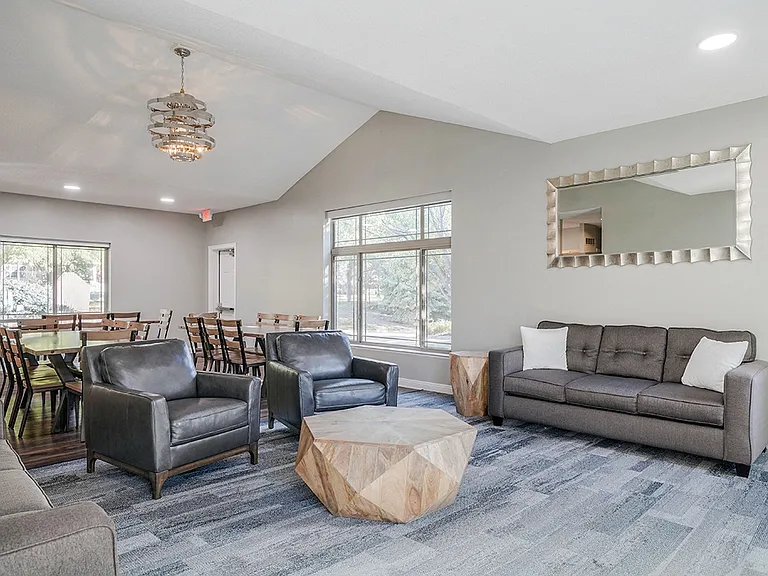 Relax in our modern and cozy clubhouse community room, perfect for unwinding.
