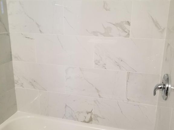 Beautiful, brand new shower and bathtub.