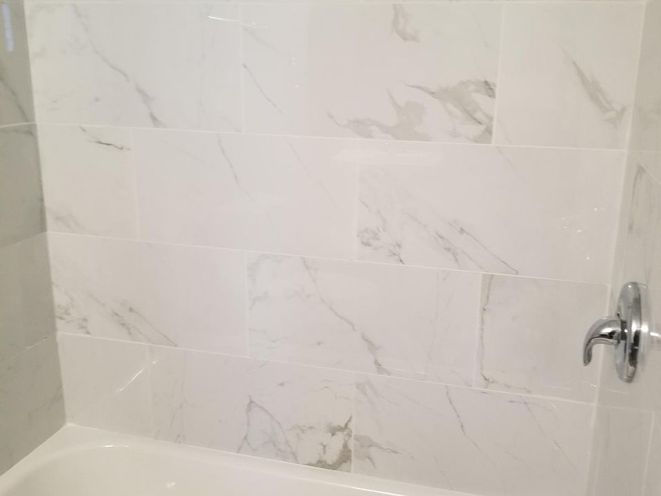 Beautiful, brand new shower and bathtub.