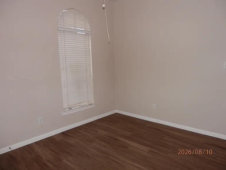 2nd bedroom. Vinyl plank flooring.