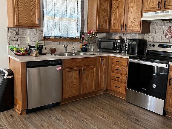 Sample decor and updates in progress to flooring and appliances