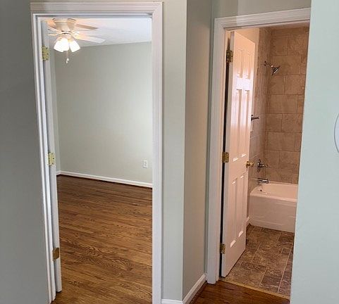 In livingroom looking towards rear bedroom and bathroom.
