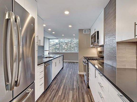 Kitchen opens up to the living and dining room.