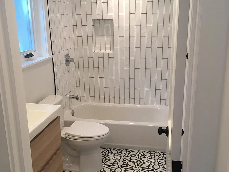 Modern, bright bathroom.