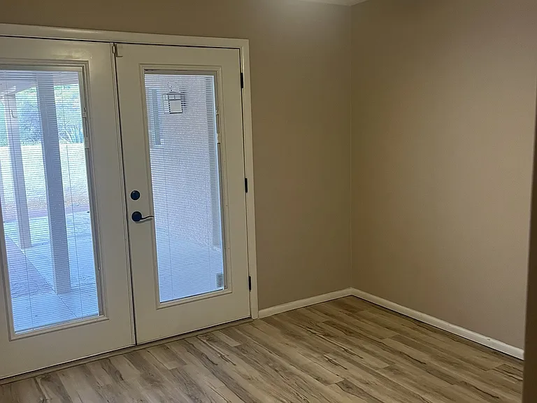 2nd bedroom with french doors to back yard