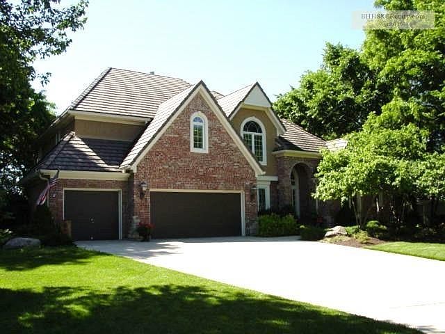 Front on cul de sac. 50 Year warranty on Lifetile roof