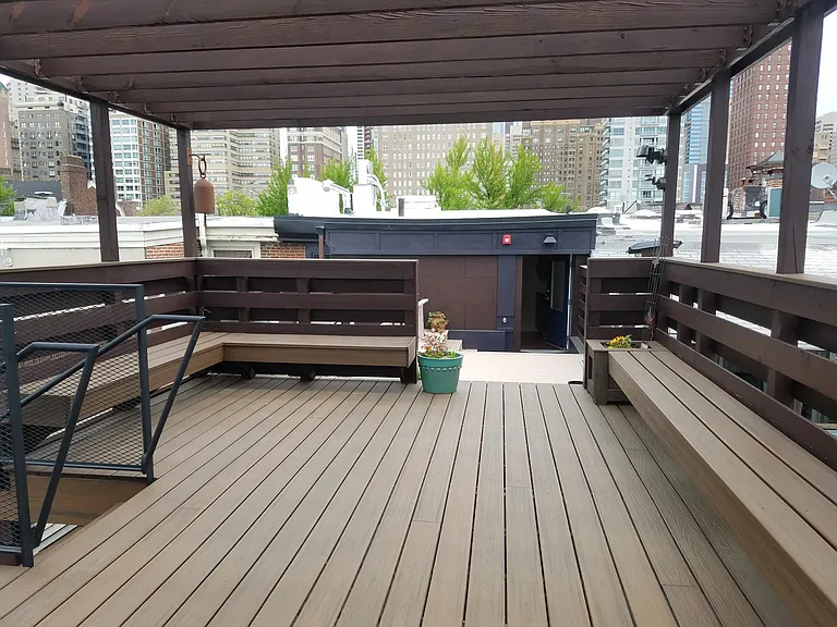 The Upper deck is shared by the four units. You can reserve it for a private party, or join neighbors for rooftop cocktail or meal. The power deck is private to Unit D. Access is from the fire escape stair to the left.